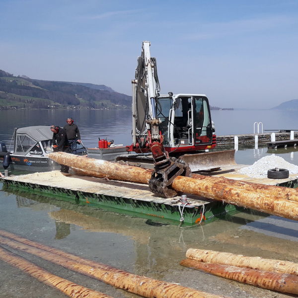 Seearbeiten / Arbeiten am Wasser mit Firma Viehauser ✓Pilotierung ✓Kranarbeiten ✓Versenken ✓Piloten ✓ Ufermauer ✓Uferstabilisierung ✓Stegbau ✓Bootsanlegestellen ✓Badeplatz